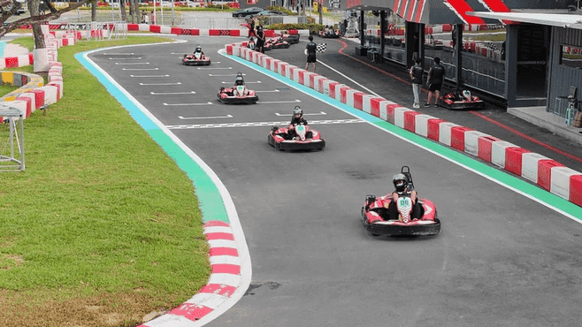 Chris racing go-karts